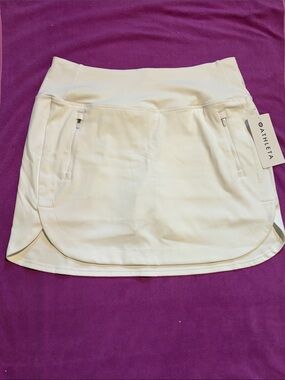 NWT Athleta White Fairway Golf Skort with Zippered Pockets and 4” attached short